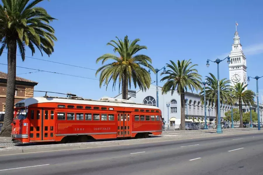 F Line streetcar rolls down The Embarcadero in front of The Ferry Building.